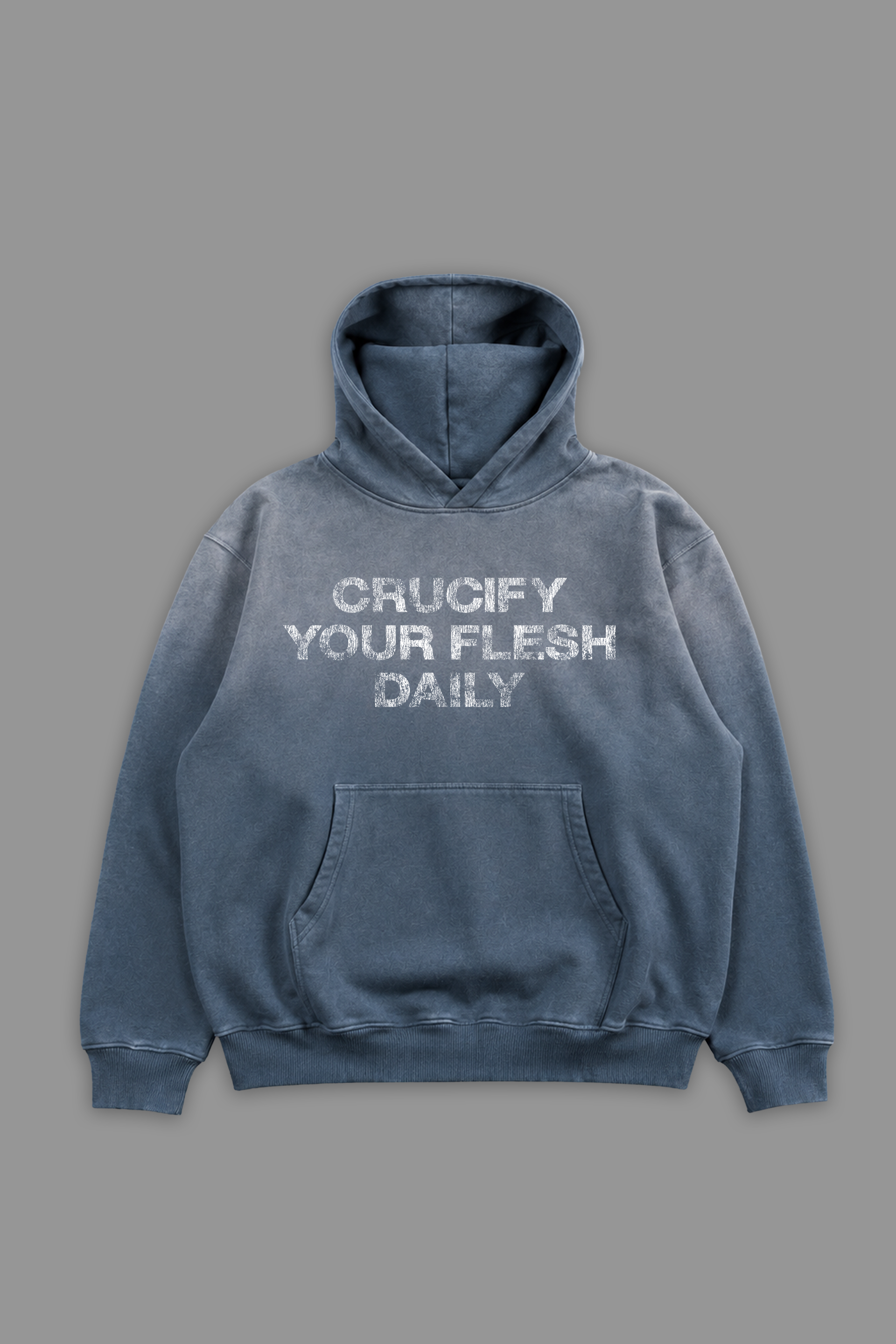 Blue hoodie with white 'crucify your flesh daily' text on a gray background