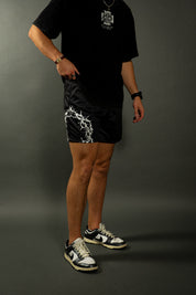 CROWN OF THORNS MESH SHORTS IN BLACK