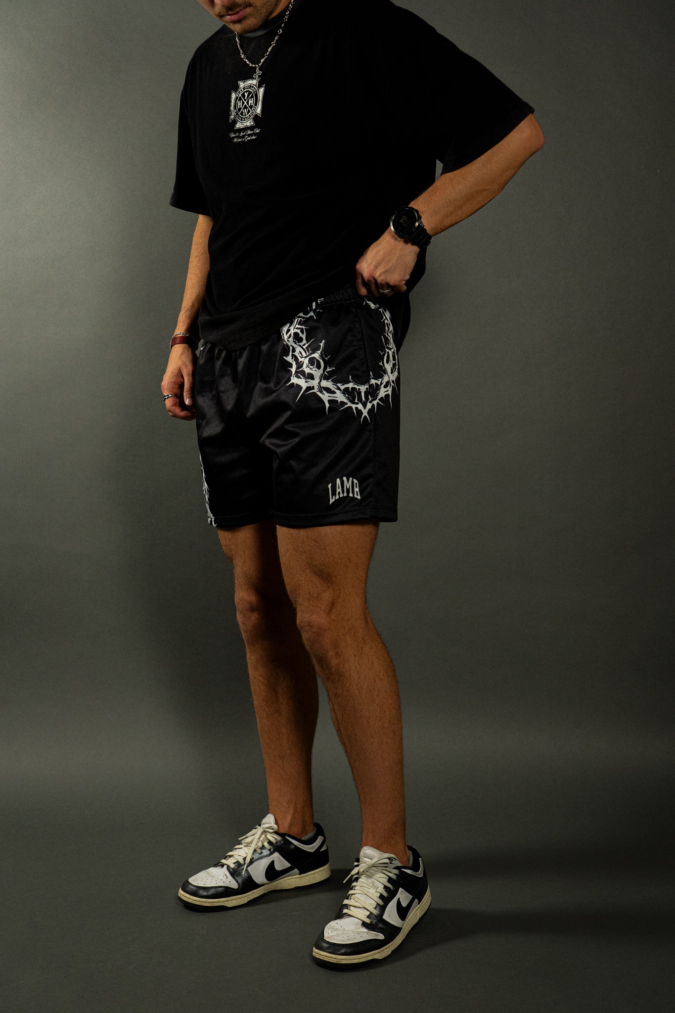 CROWN OF THORNS MESH SHORTS IN BLACK