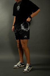 CROWN OF THORNS MESH SHORTS IN BLACK