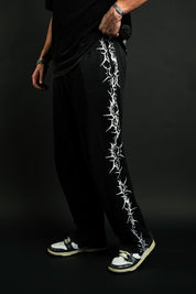 Pierced "Faded" Sweats in Black
