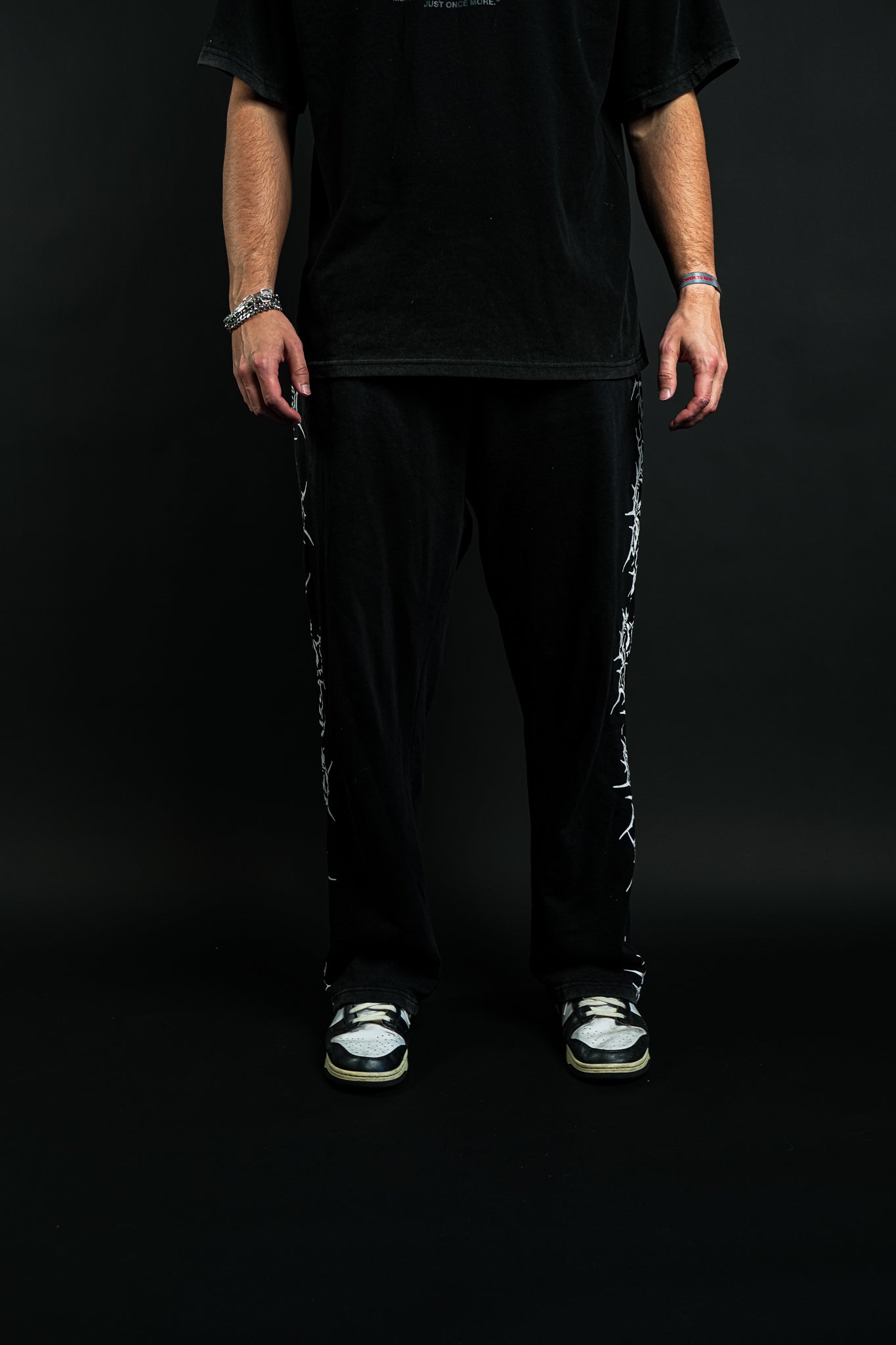 Pierced "Faded" Sweats in Black