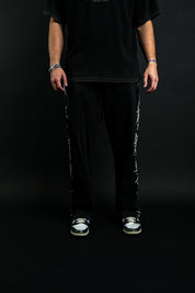 Pierced "Faded" Sweats in Black