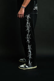 Pierced "Faded" Sweats in Black