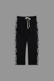 Pierced "Faded" Sweats in Black