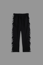 Pierced "Faded" Sweats in Black